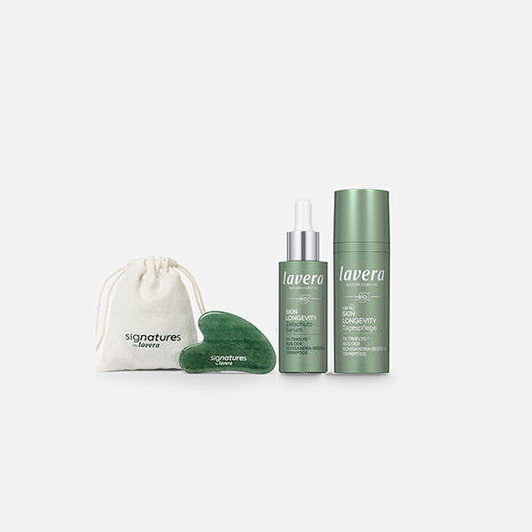 Gua-Sha Stein und Skin Longevity Serum und Tagespflege