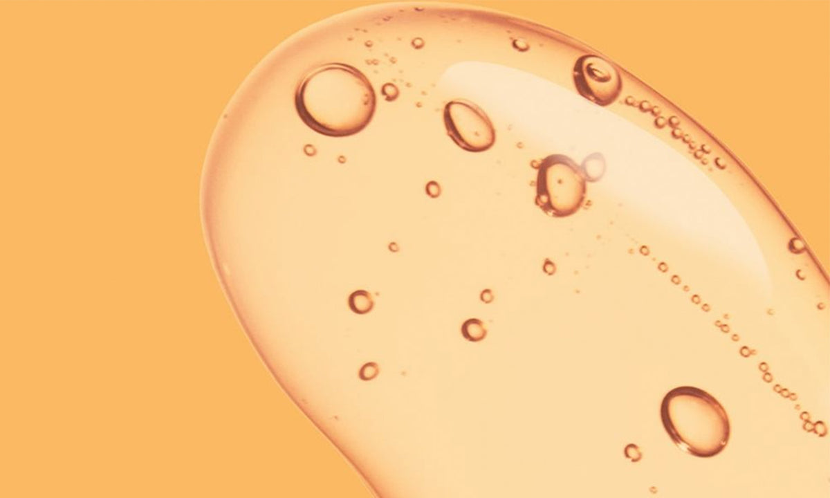 Geltextur Bubble vor hellorangenem Hintergrund